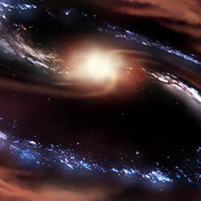 Galaxy Survives Black Hole’s Feast – For Now