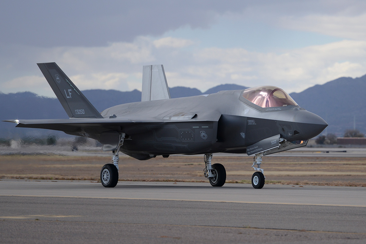 An F-35 taxis from the runway onto the flightline after successfully completing a sortie at Luke Air Force Base, Ariz., Dec. 14, 2015. Computers aboard aircraft such as the F-35 are built with microelectronics, and the Defense Department must ensure those microelectronics are safe to use before they are installed in weapons systems.