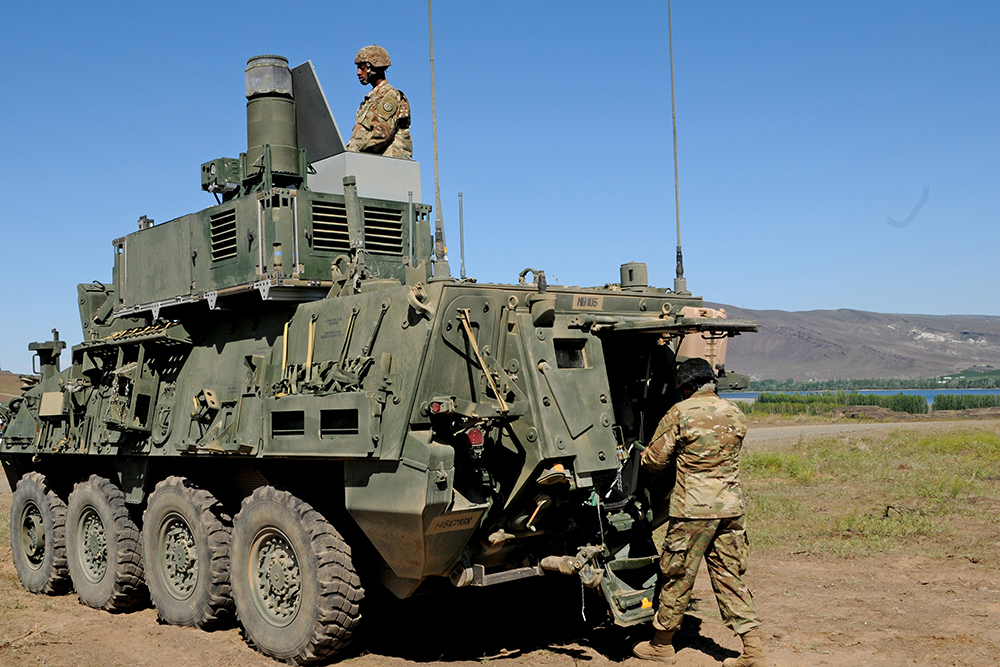 Alabama Army National Guardsmen from the 690th Chemical Company prepare their Nuclear, Biological, Chemical Reconnaissance Stryker vehicle at the Joint Warfighting Assessment 19 training exercise at Yakima Training Center, Washington, April 29, 2019.