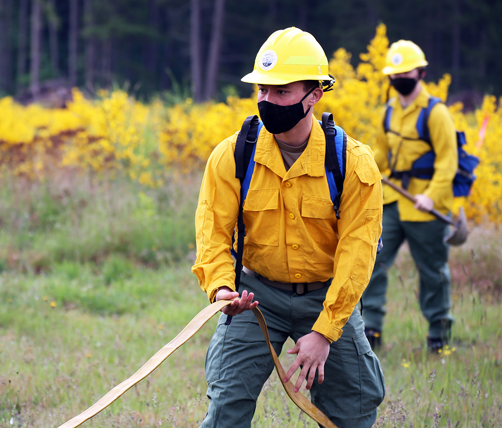 Washington National Guard soldiers take part in wildland firefighter training with the Washington Department of Natural Resources at Joint Base Lewis-McChord, Wash., May 25, 2021. The Washington National Guard has partnered with the Department of Natural Resources since 2013 to conduct wildland firefighter training annually.