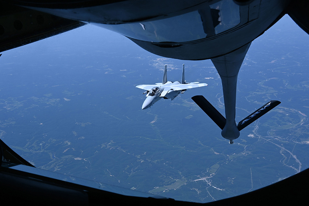 Three F-15QAs (Qatar Advanced) from the Boeing Company operating out of MidAmerica Airport, Ill., receive fuel from the 465th Air Refueling Squadron at Tinker Air Force Base, Okla., June 14, 2021. © Air Force Tech. Sgt. Lauren Kelly