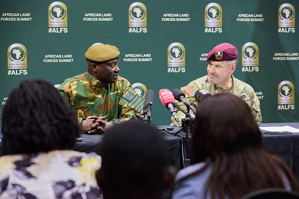 Lt. Gen. Dennis Sitali Alibuzwi, the Zambia Army commanding general, and U.S. Army Maj. Gen. Todd Wasmund, commanding general, U.S. Army Southern European Task Force, Africa, field questions at a news conference during African Land Forces Summit 2024 in Livingstone, Zambia, April 22, 2024. © Army Sgt. 1st Class Leron Richards