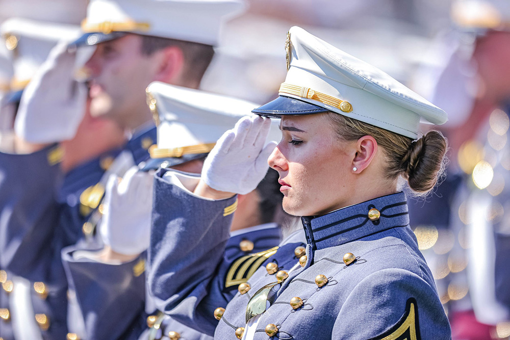 A cadet salutes during the graduation ceremony at the U.S. Military Academy, West Point, N.Y., May 25, 2024
