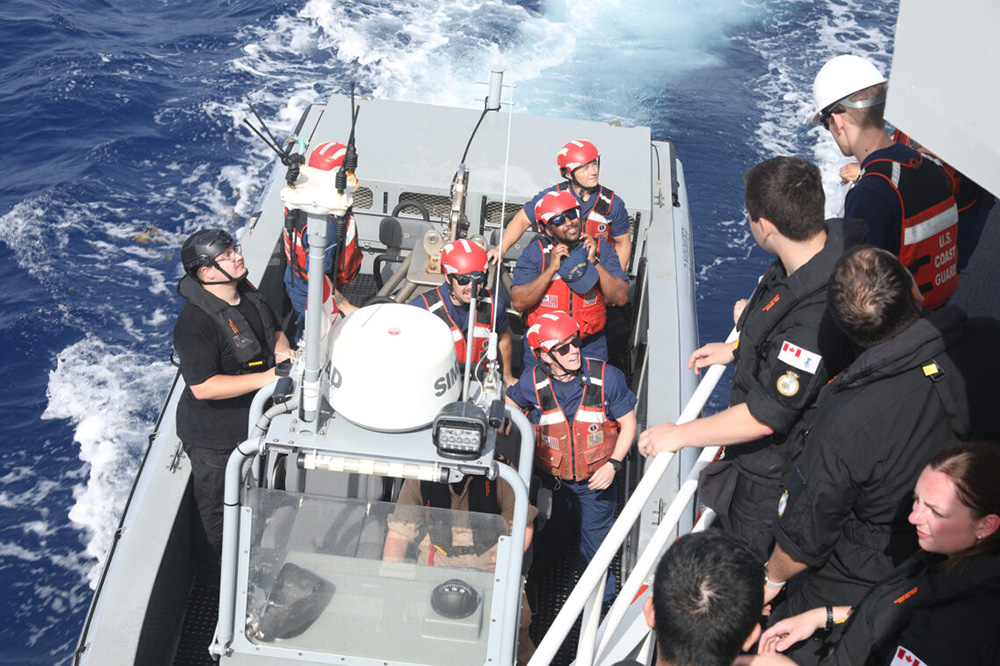Members of the U.S. Coast Guard and the Royal Canadian Navy conduct passenger transfer training off the coast of Bridgetown, Barbados, during Exercise Tradewinds 24, May 7, 2024. © Army Staff Sgt. Elizabeth O. Bryson