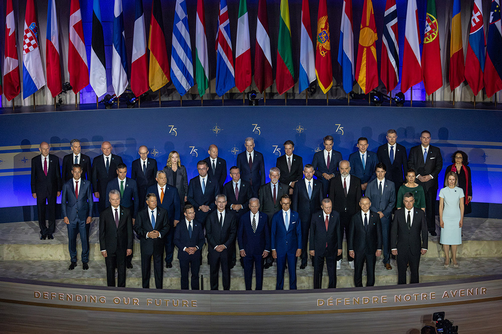 President Joe Biden stands next to other heads of state for a group photograph during an event in Washington marking NATO’s 75th anniversary, July 9, 2024. © NATO