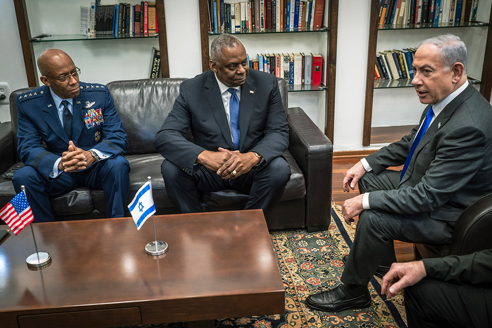 Chairman of the Joint Chiefs of Staff Air Force Gen. CQ Brown, Jr., and Secretary of Defense Lloyd J. Austin III meet with Israeli Prime Minister Benjamin Netanyahu in Tel Aviv, Israel, Dec. 18, 2023. Austin and Brown traveled to Israel to meet with counterparts and underscore unwavering U.S. commitment to Israel's right to defend itself in accordance with international humanitarian law. © Chad J. McNeeley, DOD