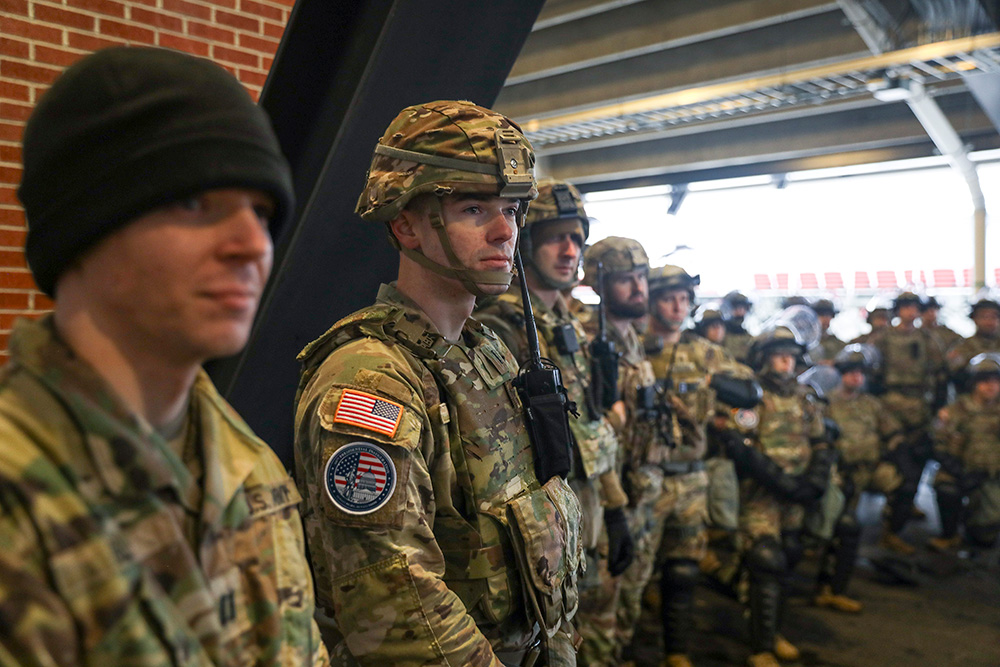 Service members of the Joint Task Force–District of Columbia stand shoulder to shoulder in Washington, D.C., Jan. 19, 2025. The task force is a scalable and tailorable entity that supports presidential inaugurations every four years and is led by the commanding general of the District of Columbia National Guard. © Army National Guard Master Sgt. Zach Sheely