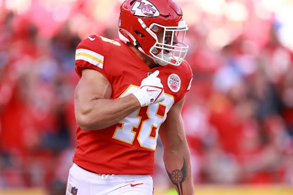 Wearing the number 48, Cole Christiansen celebrates after making a play during a Kansas City Chiefs game. © Courtesy Photo, Cole Christiansen