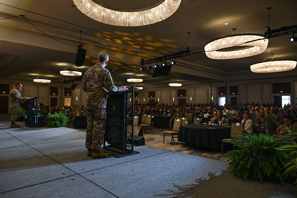 Army Gen. Bryan Fenton, commander of U.S. Special Operations Command, right, and Sgt. Maj. Shane Shorter, command senior enlisted leader of Socom, provide a keynote speech during the kickoff of Special Operations Forces Week in Tampa Bay, Fla., May 6, 2025. © Air Force Tech. Sgt. Marleah Miller